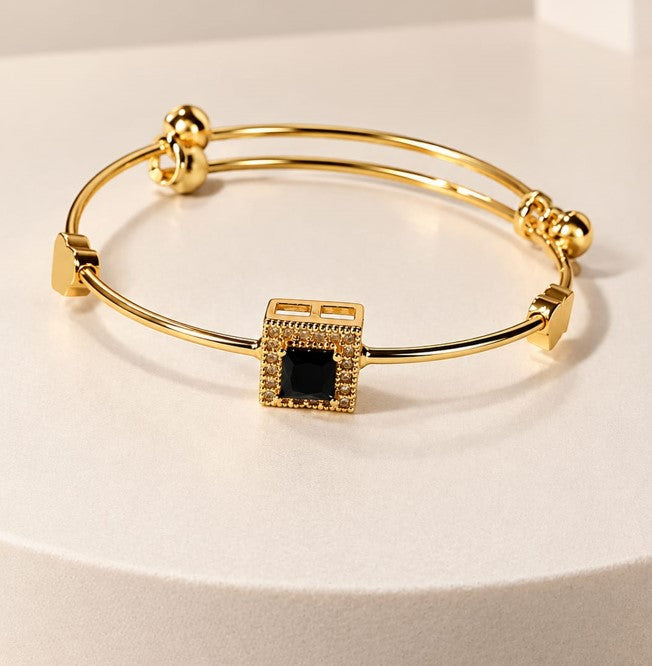 Elegant Gold-Tone Black Stone Bracelet